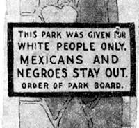 Sign: This park was given for white people only. Mexicans and Negroes Stay Out. Order of Park Board.